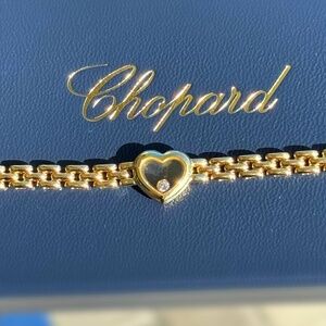 Vintage Chopard Happy Diamonds 18k yellow gold Heart panther link 0.07Ct Floatin